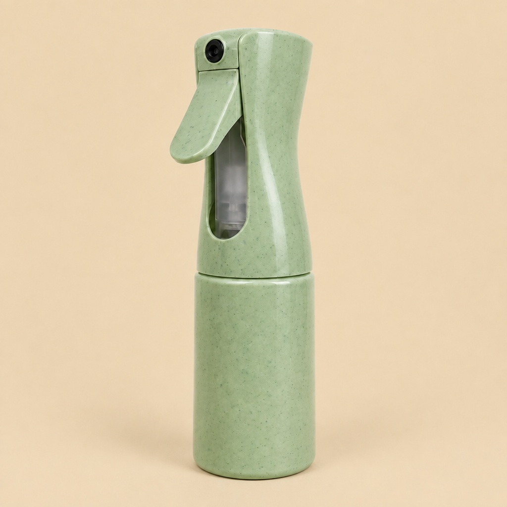 Green mist bottle with beige background